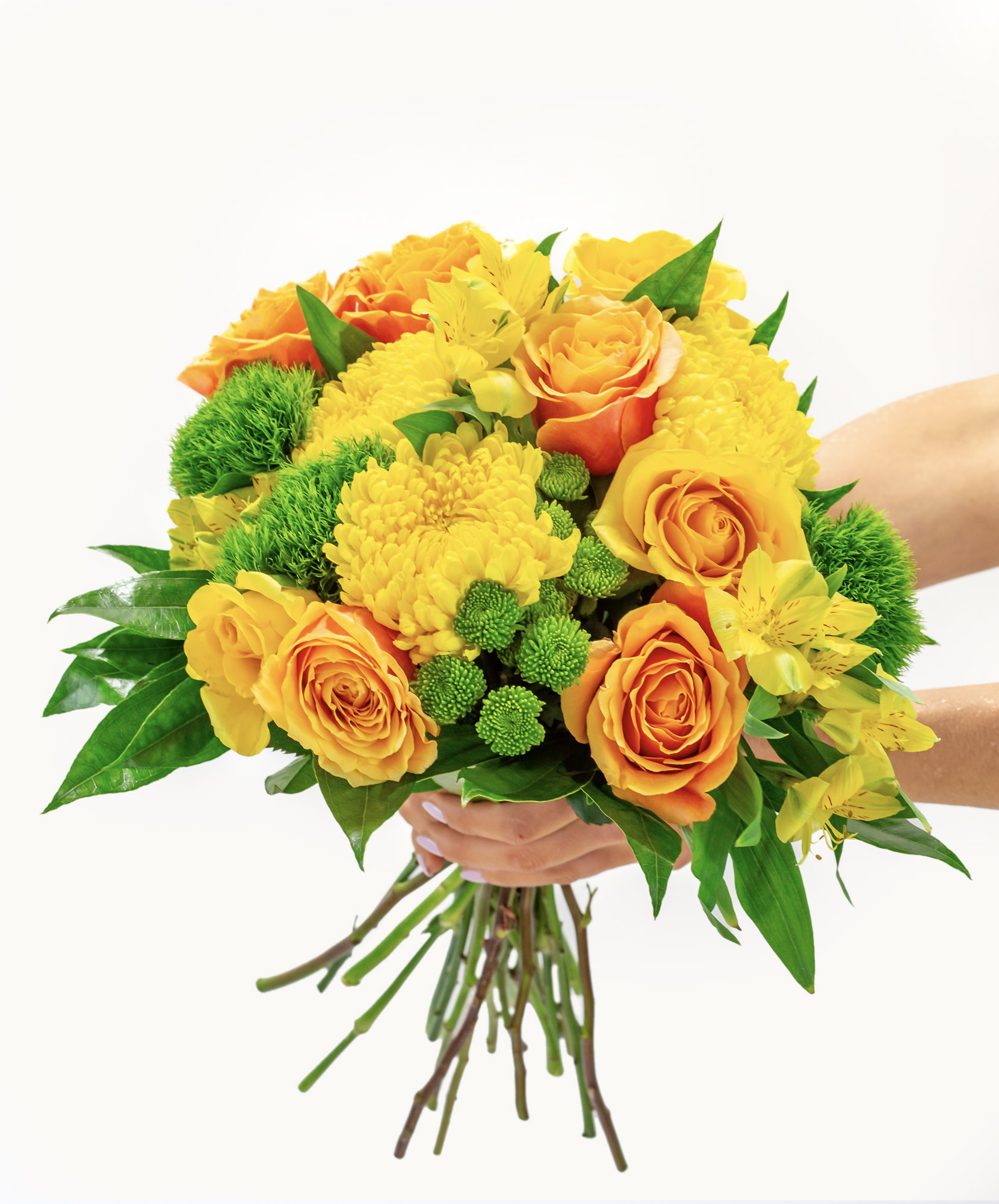 Vibrant bouquet featuring yellow roses, green accents, and mixed floral varieties.