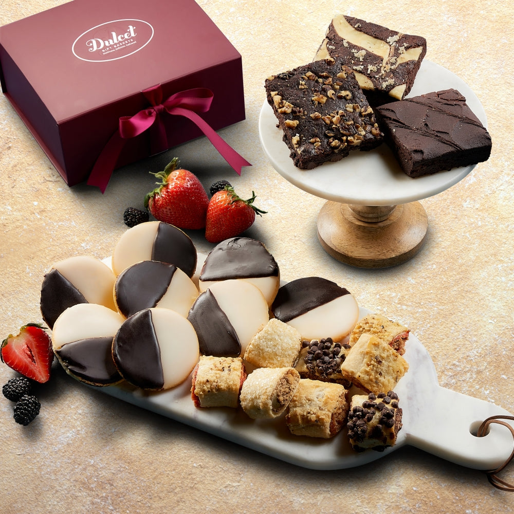 Decadent assortment of gourmet cookies and brownies on a marble platter, perfect for sharing.