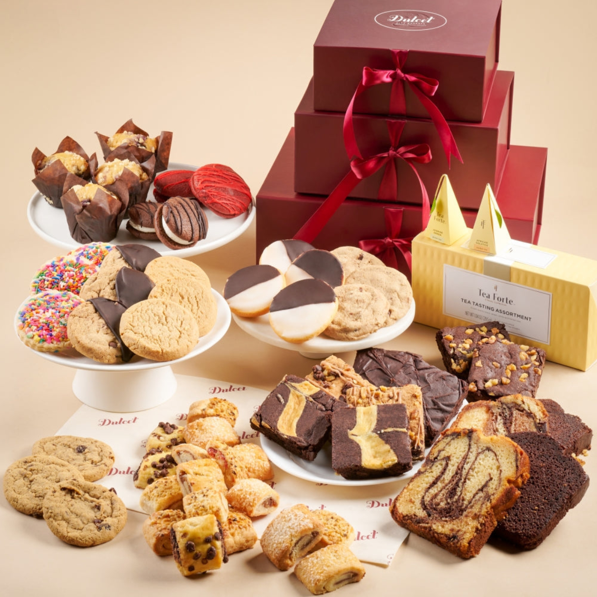 An enticing assortment of gourmet cookies and brownies in elegant packaging, perfect for gifting.