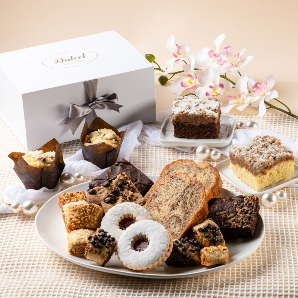 Delicious dessert platter featuring assorted baked goods and treats in elegant presentation.