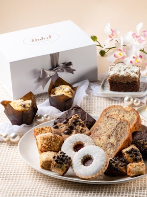 Delicious dessert platter featuring assorted baked goods and treats in elegant presentation.