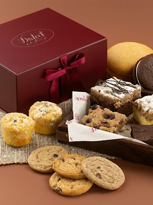 Delicious assortment of cookies and brownies presented in an elegant gift box.