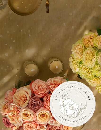 Elegant rose bouquet in soft hues for a sophisticated celebration, marking ten years of bloom.