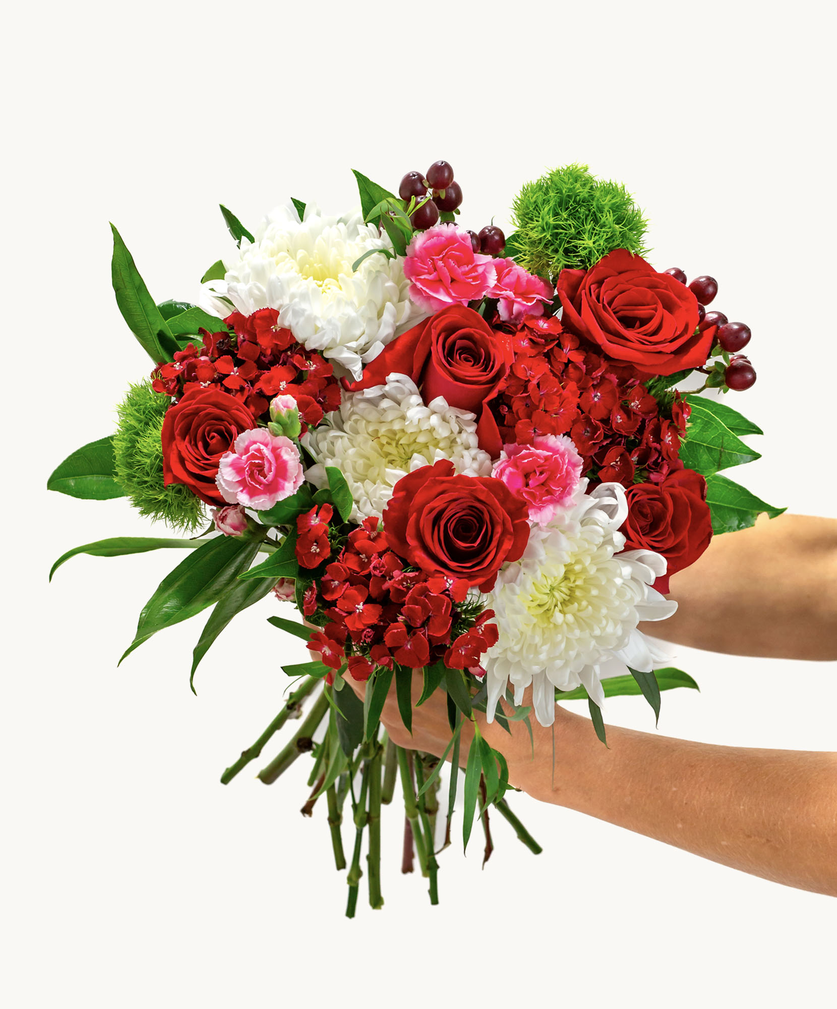Vibrant bouquet featuring red roses, pink blooms, and white chrysanthemums, elegantly arranged.