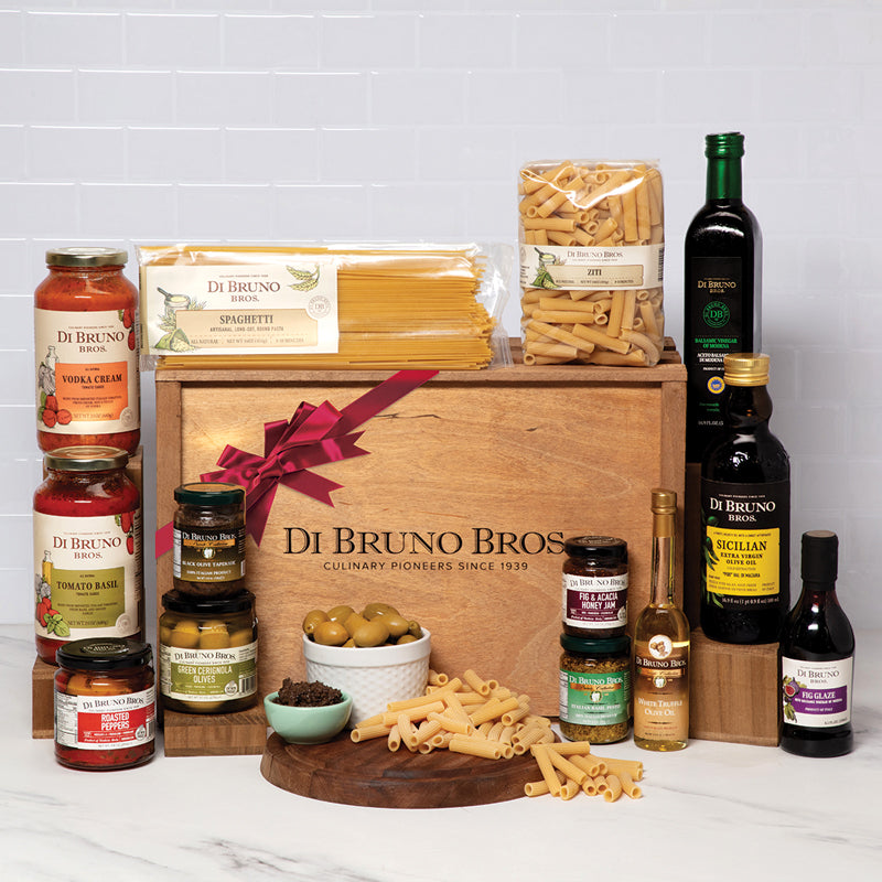 Gourmet Italian food gift box featuring pasta, sauces, oils, and specialty ingredients.