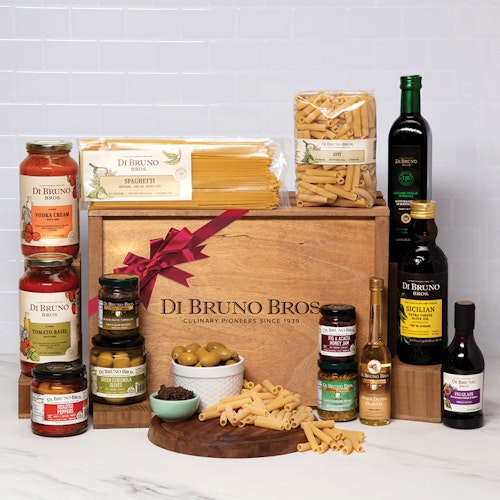 Gourmet Italian food gift box featuring pasta, sauces, oils, and specialty ingredients.