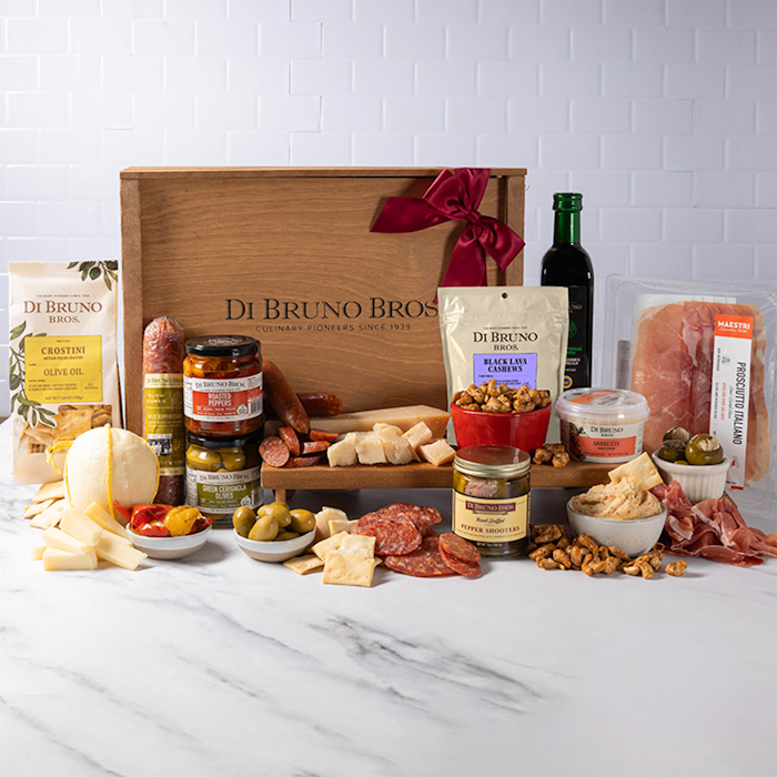 Elegant gift basket filled with gourmet cheeses, meats, and delightful snacks. Perfect for sharing.