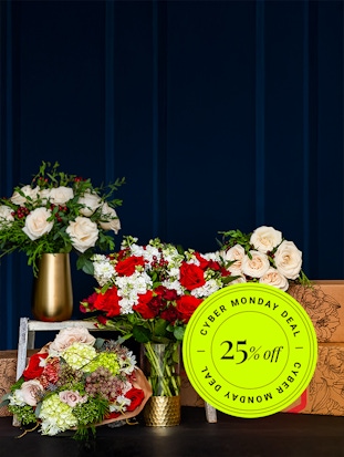 Vibrant flower arrangements featuring red and white blooms, perfect for Cyber Monday gifts.