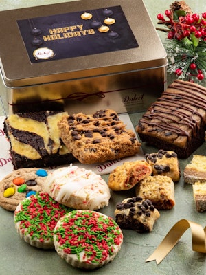 Delicious holiday treat assortment including cookies, brownies, and festive snacks.