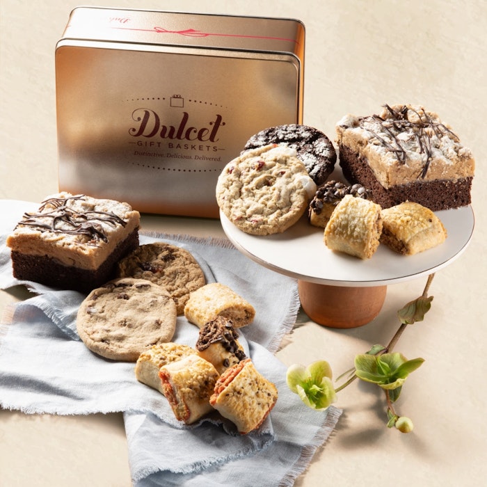 Delicious assortment of cookies and brownies elegantly displayed on a pedestal and tray.
