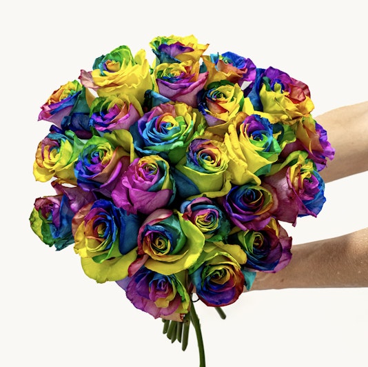 Vibrant rainbow rose bouquet featuring a stunning array of colorful blooms for celebrations.