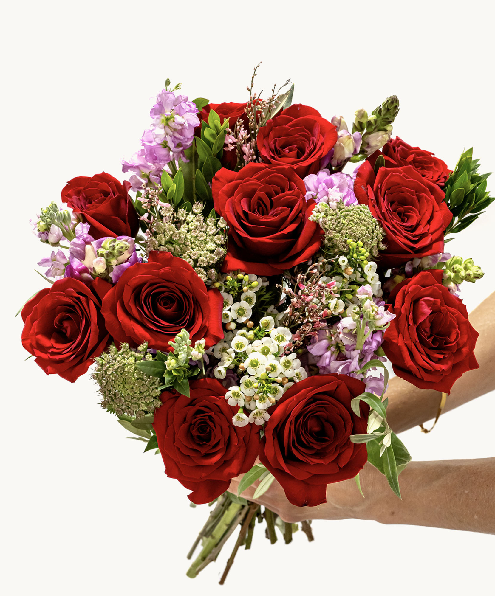 Vibrant bouquet featuring lush red roses and delicate purple flowers, perfect for any occasion.
