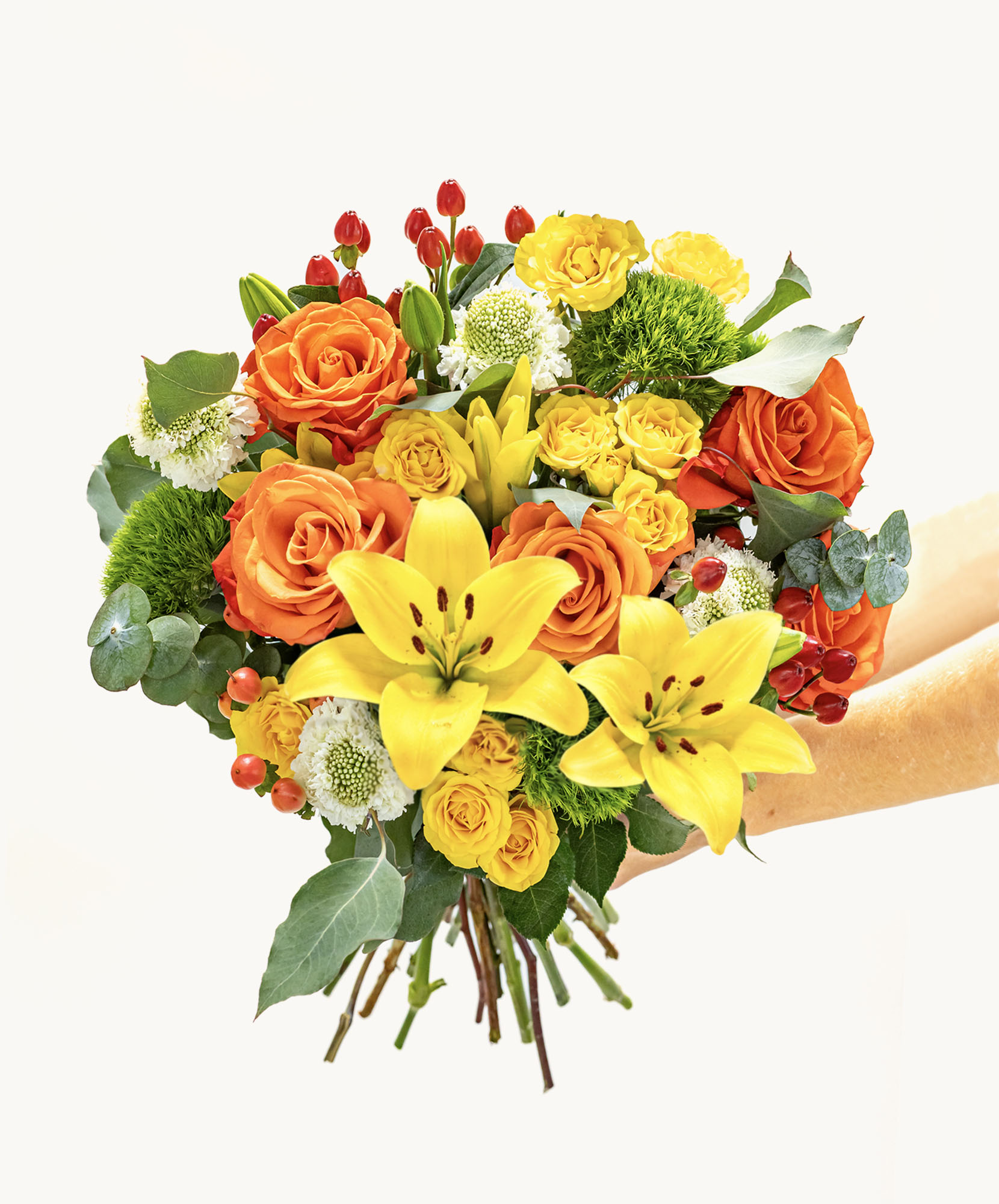 Vibrant bouquet featuring orange roses, yellow lilies, and lush greenery for special occasions.