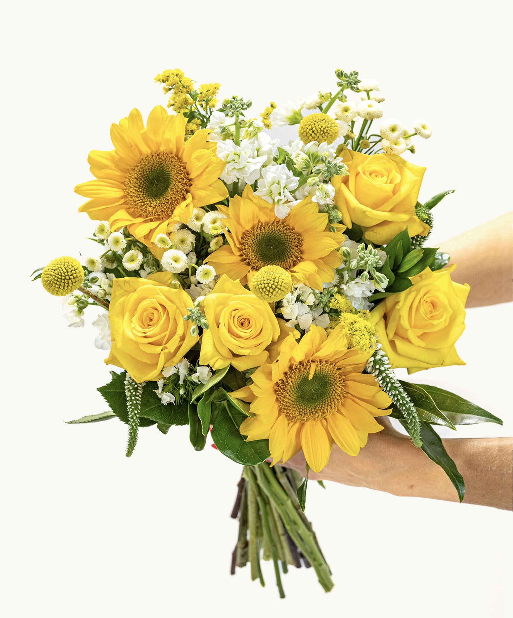 Bright and cheerful bouquet featuring sunflowers, yellow roses, and white accents.