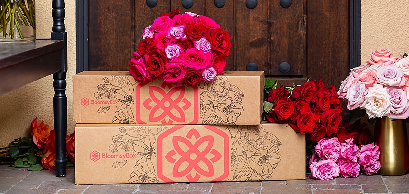 Beautifully arranged colorful roses in BloomsyBox packages, perfect for gifting.
