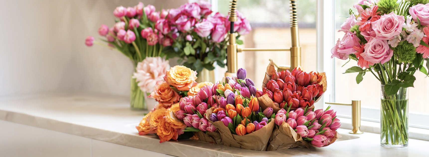 Vibrant mixed bouquet featuring tulips and roses, perfect for brightening any space.