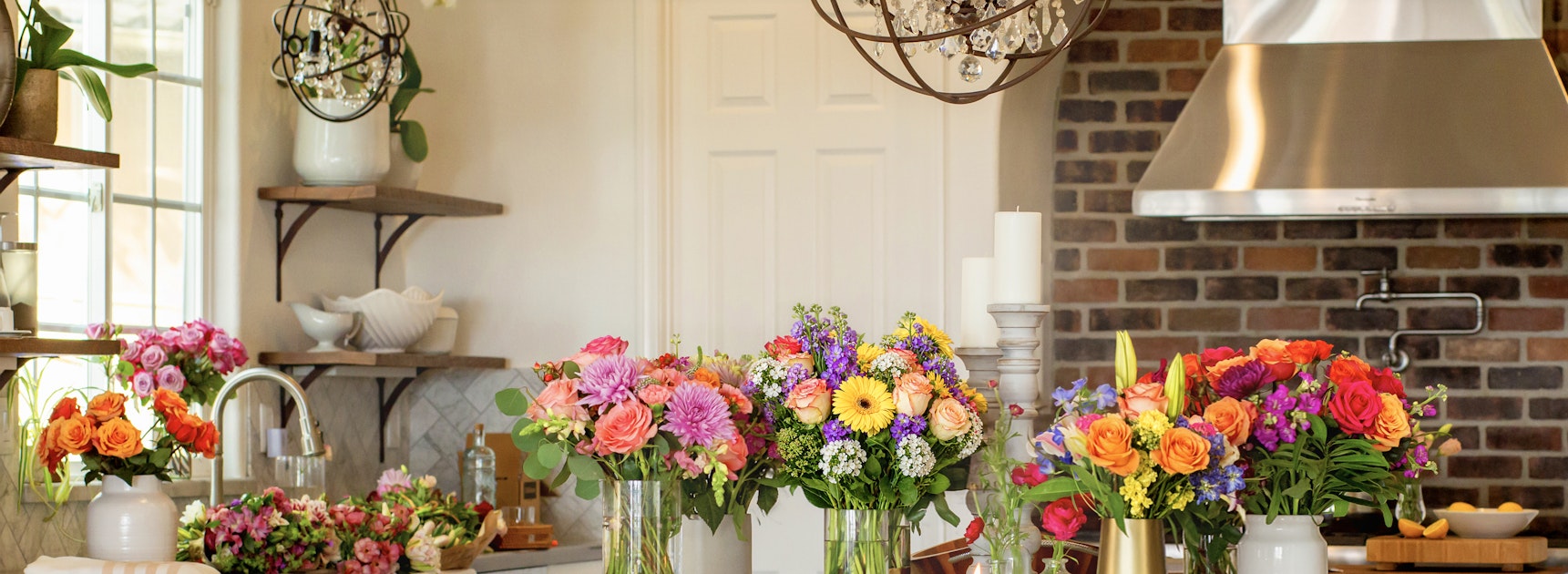 Vibrant kitchen showcasing colorful floral arrangements in beautiful vases.