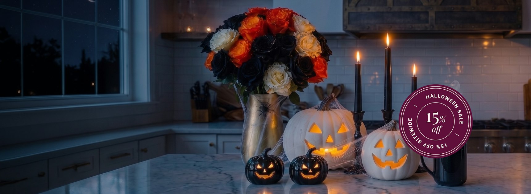 Spooky Halloween decor featuring carved pumpkins, candles, and a vibrant floral arrangement.