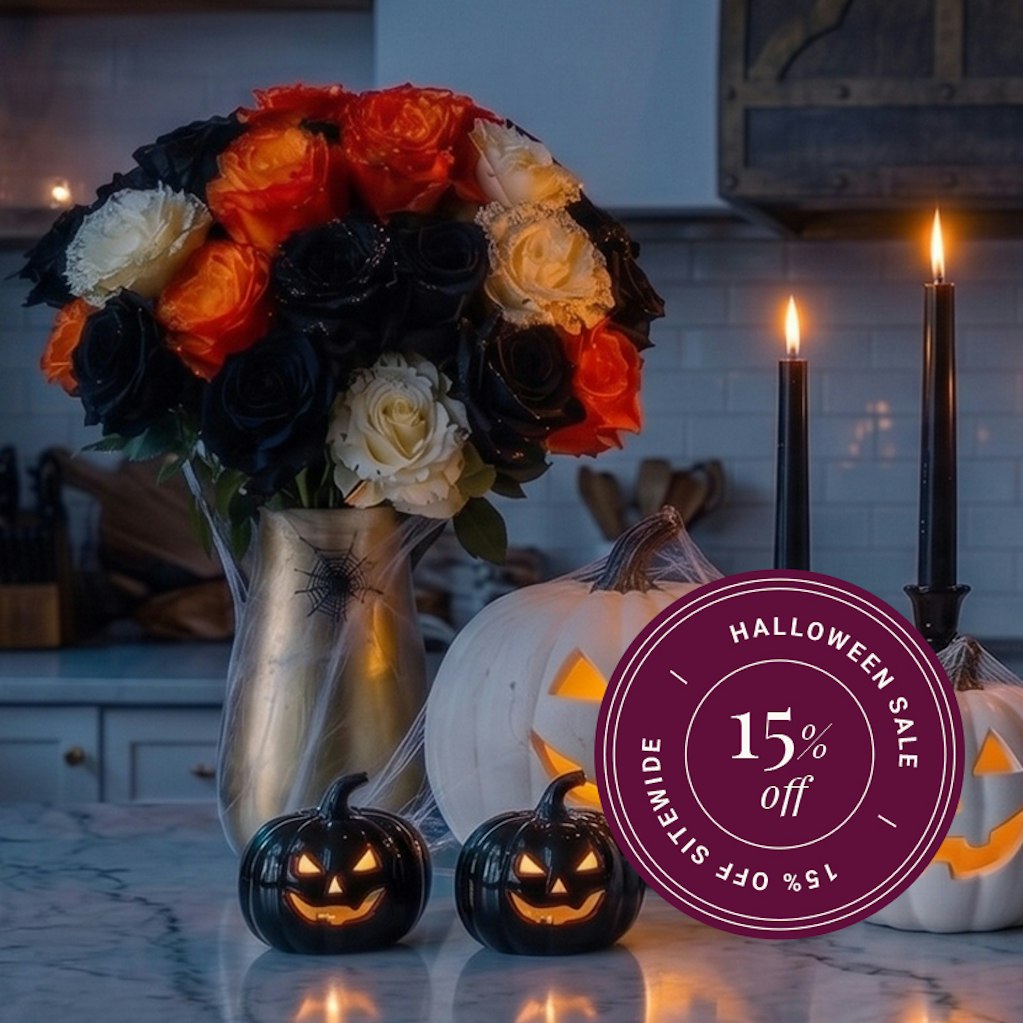 Spooky Halloween bouquet featuring black, orange, and white roses, perfect for decor.