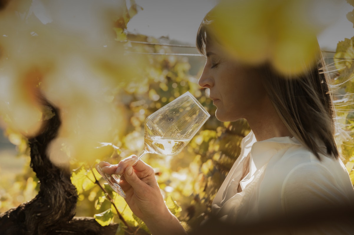 Woman tasting the wine