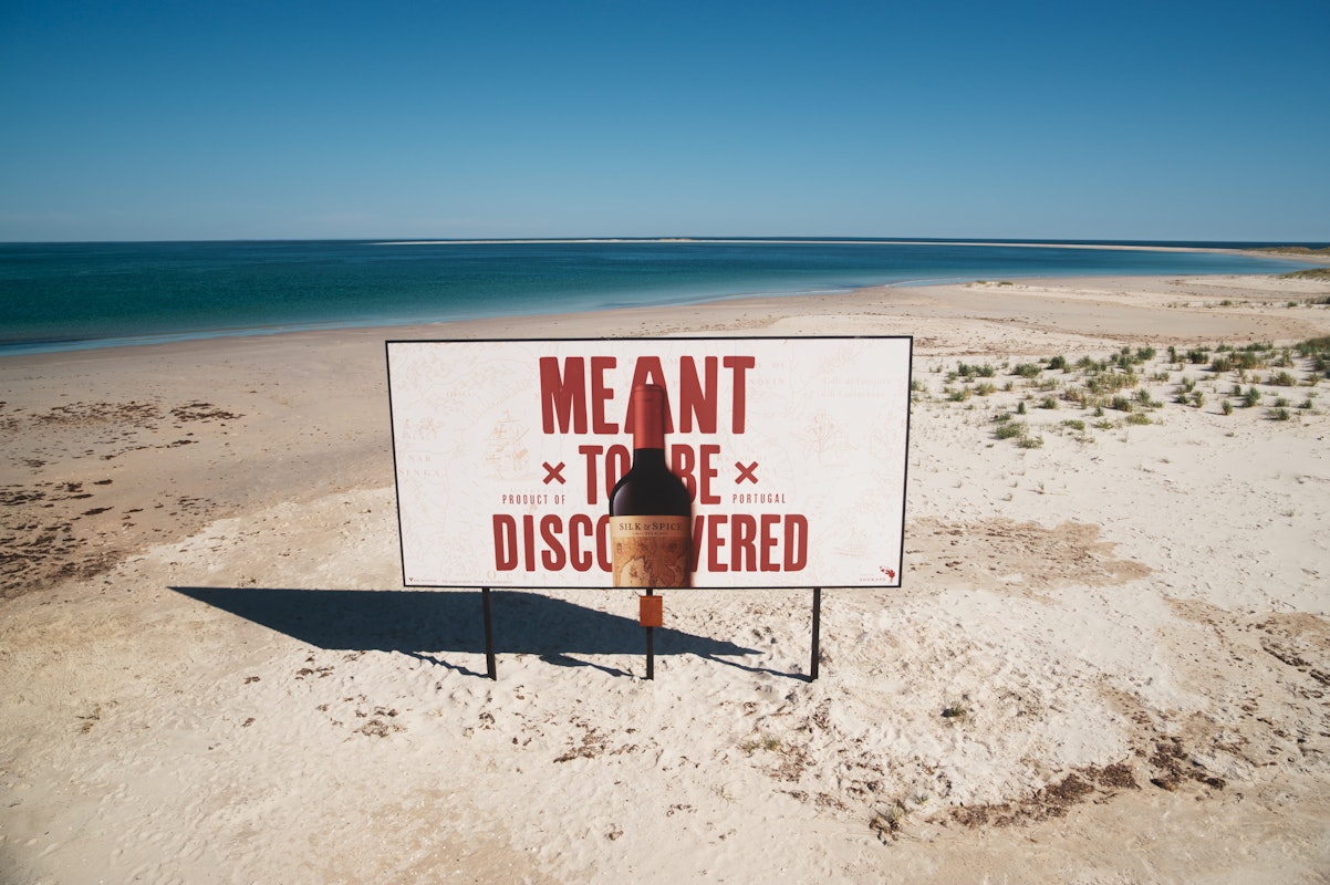 cartaz publicitario playa