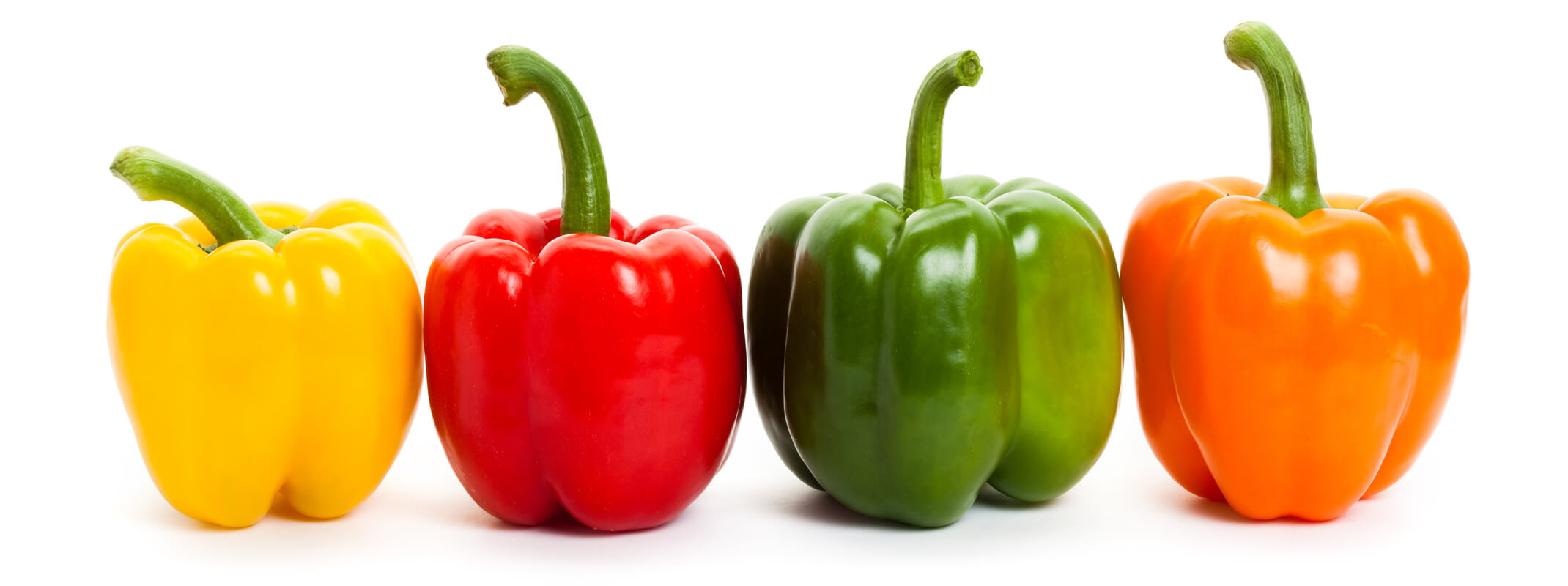 4 different colors of bell peppers, yellow, red, green and orange
