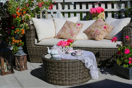 Patio with Seating, Table with Tea Set, Bougainvillea, Geraniums, Roses and Lanterns