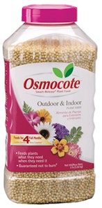 Plastic bottle of osmocot outdoor and indoor plant food