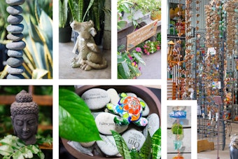 A collage of 7 images: a stacked stone sculpture with agaves in the background; a stone buddha head near a leaf and some wooden shelves; a bowl of stones with different sayings carved in them and a small talavera turtle on top - with some houseplant leaves in the foreground; a baby dragon sculpture near some houseplants; a closeup of a colorful shattered glass decorative rain chain; and a wide variety of rain chains and windchimes hanging up on display at the store