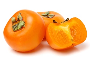 whole and half persimmons fruit