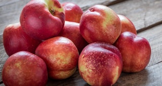 a pile of snow queen nectarine on a table