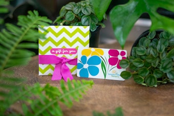 SummerWinds Nursery Gift Card and envelope near houseplants