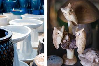 White birdbaths surrounded by pots, and an owl and mushroom sculpture near a turtle sculpture and a rock with words.