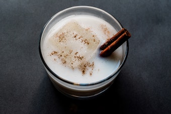 Horchata with a cinnamon stick in it.