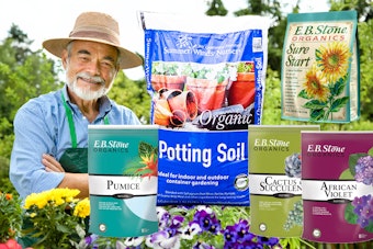 Gardener with SummerWinds Organic Potting Soil, and 4 soil amendments from EB Stone Organics.