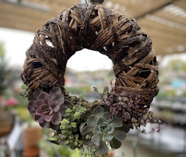succulent decorated wreath hanging