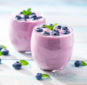 blueberry smoothie garnished with blueberries