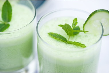 Cucumber mint cooler with fresh mint and a cucumber slice.