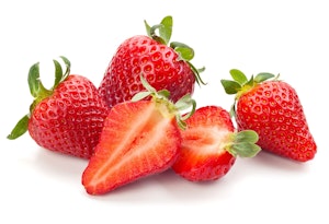 ripe strawberries on white