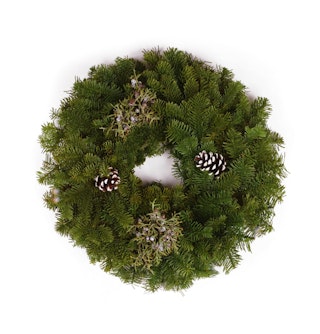 holiday decor - mixed candle ring with mixed greens and pinecones