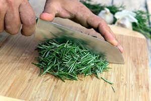 chopping rosemary
