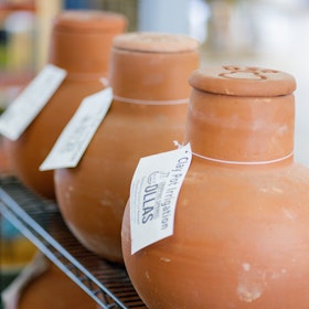 3 Ollas Pots on a shelf at SummerWinds Nursery.
