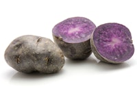 blue potatoes blue potatoes cut in half and whole