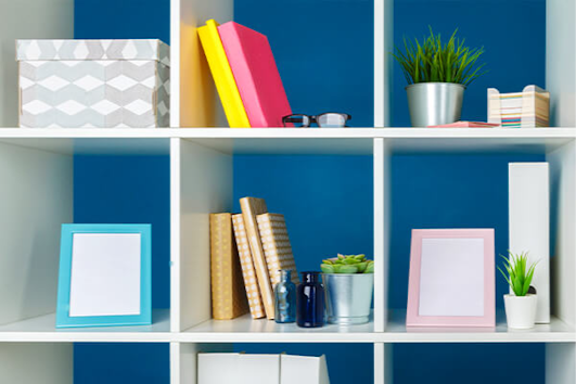 shelves with colorful office suplies and houseplants summerwinds california