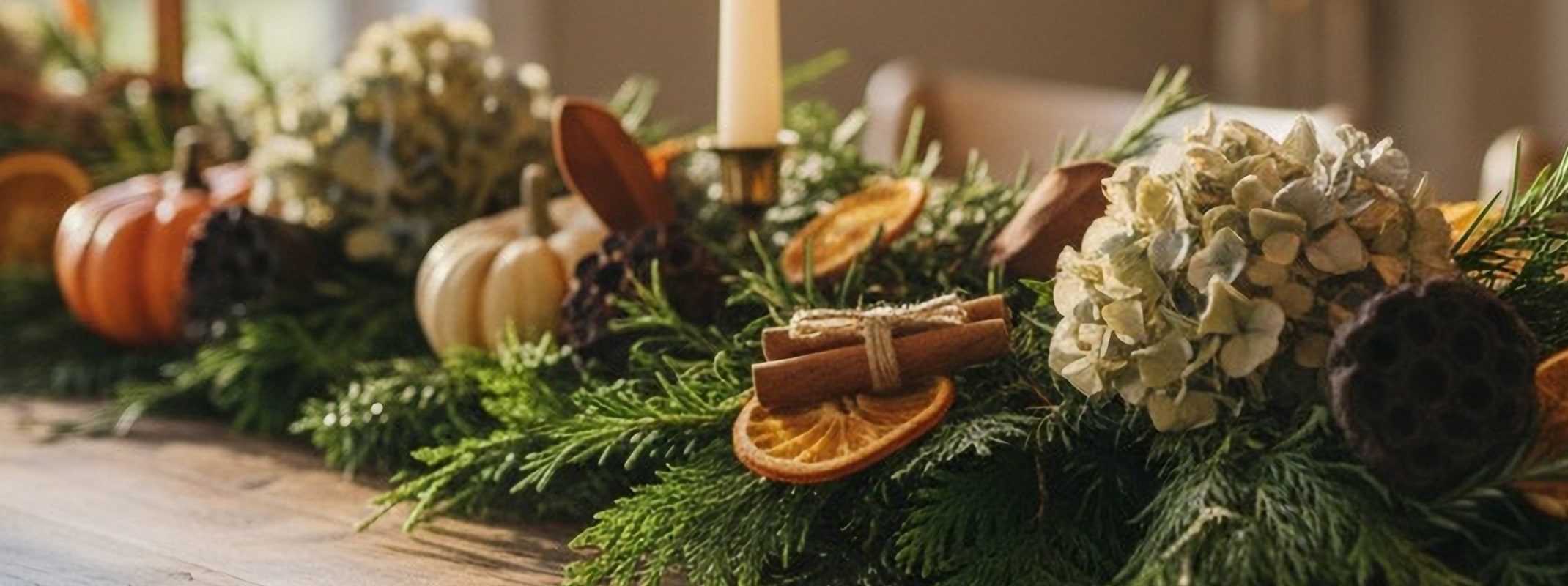 greenery garland on table decorated for thanksgiving