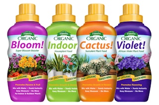 Four bottles of Espoma Organic fertilizers: Bloom! super blossom booster, Indoor! houseplant food, Cactus! succulent plant food, and Violet! African violet plant food.