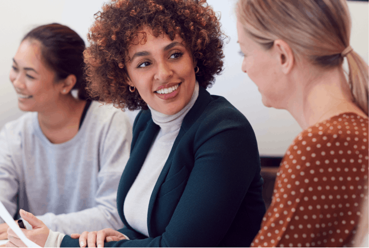 Businesswomen talking to each other