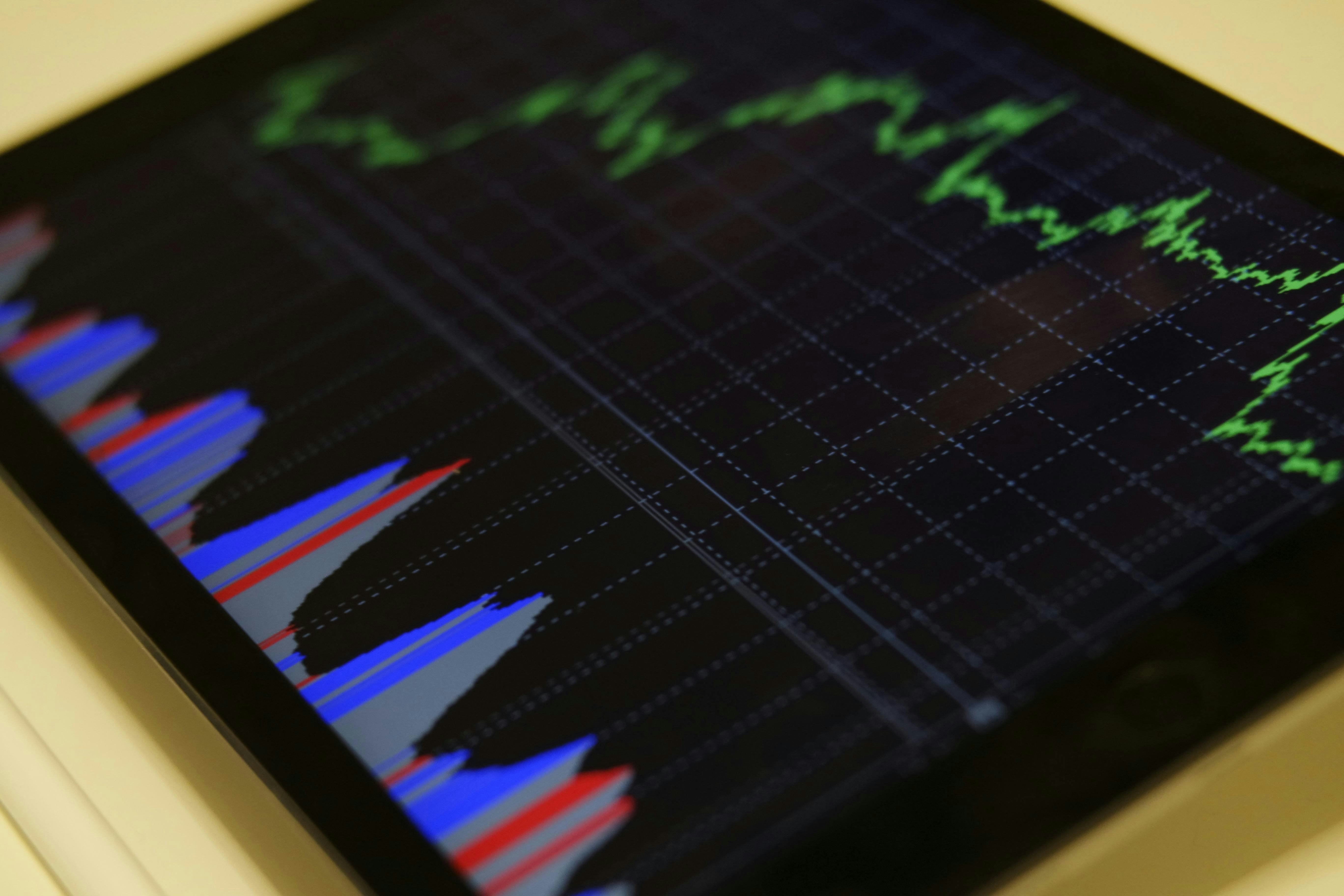 Photo of tablet with generic data graphs
