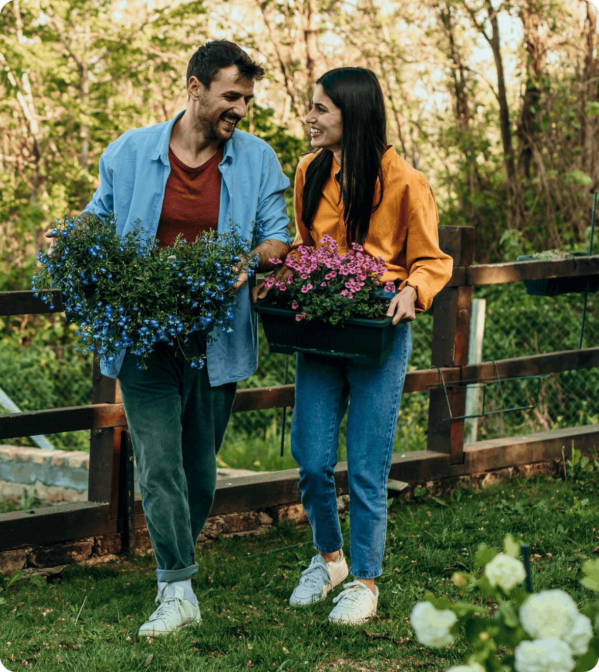 Couple holding flowers together