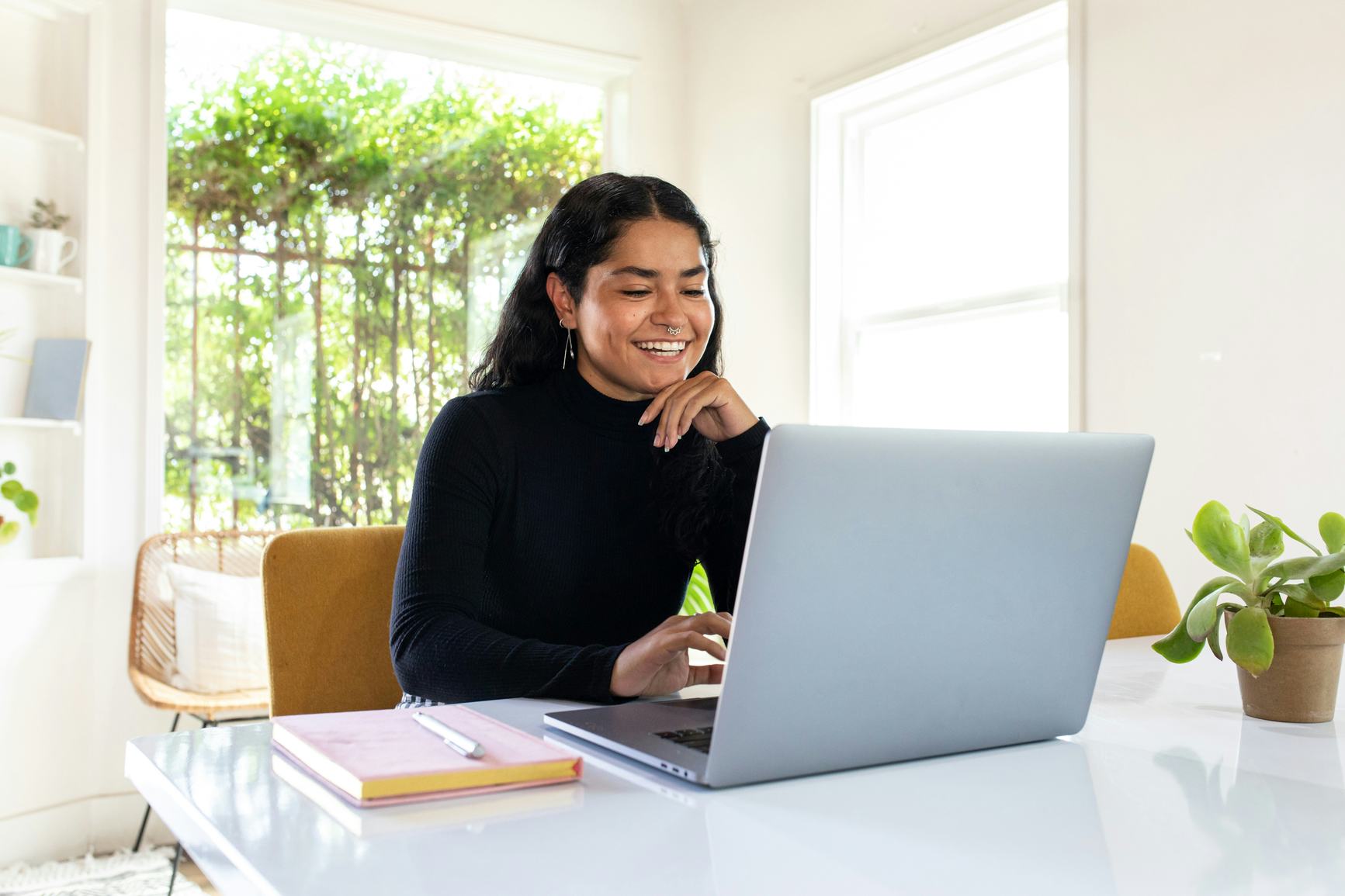 Woman looking at her laptop
